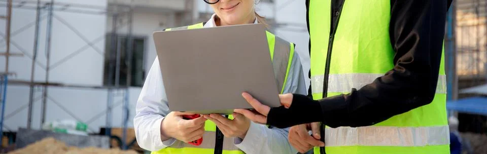 Team of architect or engineer looking laptop for inspection and planning co.. 写真素材