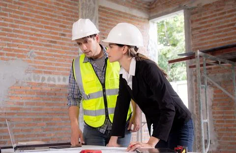 Team architect or engineer man and woman meeting for planning and strategy .. Stock Photos