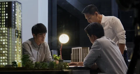 Team architect working with serious emotion for building project at office. Stock Footage 115242573