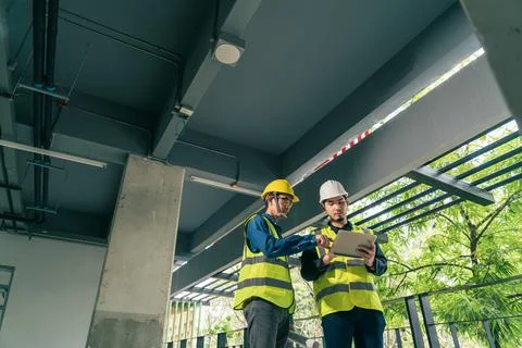 Team Architect working use BIM technology and digital construction applicatio Stock Photos