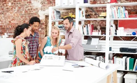 Team, architects and discussion with model in office, real estate design or.. Stock Photos