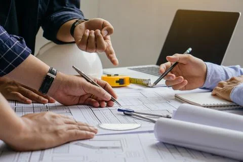 Team of architects and engineer Planning Design Draw Teamwork Concept Stock Photos