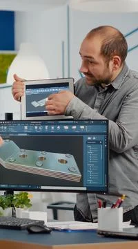 Team of architects and engineers working on building prototype project Stock Photos