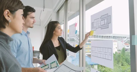 Team of architects brainstorming ideas in office. Video stock 91888959