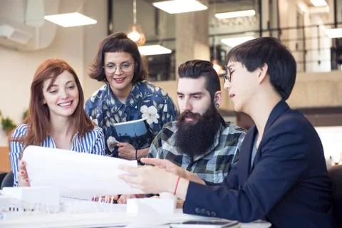 Team of architects collaborating on a project Stock Photos