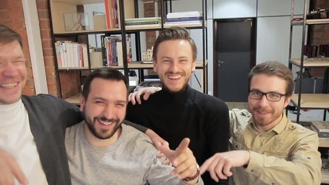 Team architects having fun in front of camera in office architect bureau. Young Stock Footage 77505715