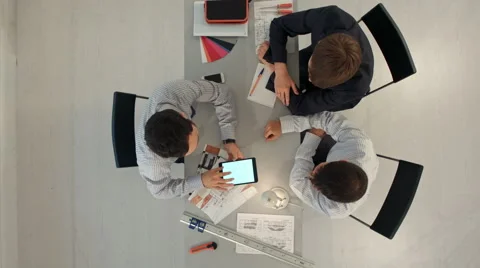 Team of architects working on construction plans. Top view 動画素材 58170070