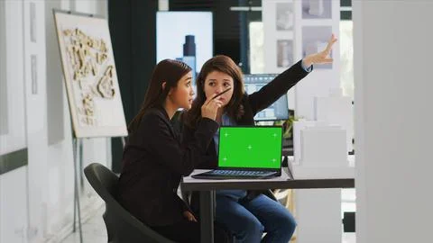 Team of architects working with greenscreen layout on pc 스톡 사진