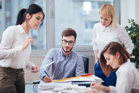 Team of architects working in the office Stock Photos