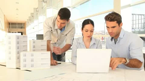 Team of architects working on project Stock Footage 18194819