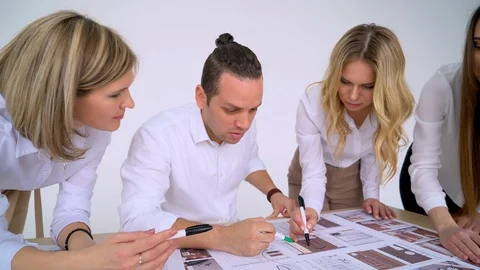 Team of architects working on project Stock Footage 88609107