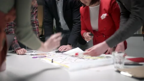 Team Of Architects Working On Project Paper Blueprint. Group Of Modern Business Stock Footage 132885739