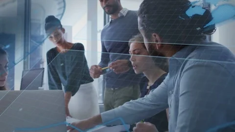 Team around laptop pointing, sparking document review for business decisions Stock Footage 333336654