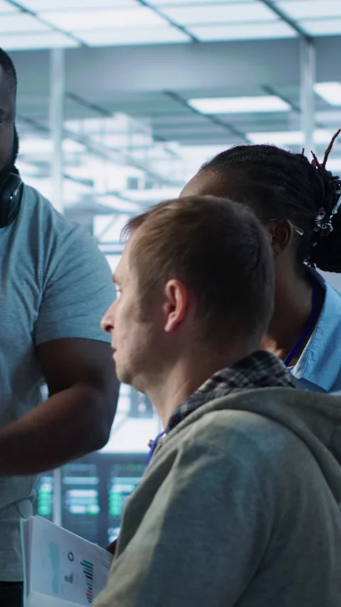 Team of artificial intelligence engineers repairing data center systems Stock Footage 319573800