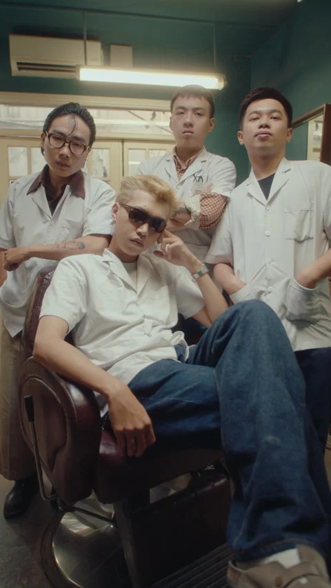 Team of Asian Barbers Posing for Camera in the Barbershop Stock Footage 238056225