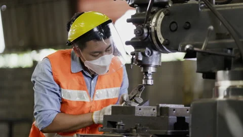 Team Asian Machine engineer wearing face shield work active in factory Industry. Stock Footage 159222352