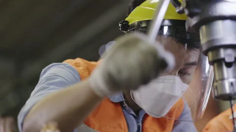 Team Asian machine engineers is providing maintenance services for machines Stock Footage 150960636