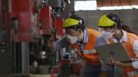 Team Asian machine engineers is providing maintenance services for machines  Stock Footage 151055794