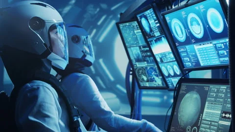 Team of astronauts in a space suits aboard the orbital station. A crew of Stock Footage 230255615