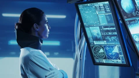 Team of astronauts in a space suits aboard the orbital station. A crew of Stock Footage 231129946