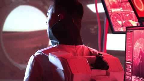 Team of astronauts in a space suits aboard the Mars station. A crew of Stock Footage 237108271