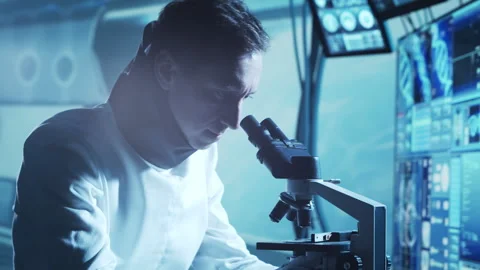 Team of astronauts in a space suits aboard the orbital station. A crew of Stock Footage 259389609