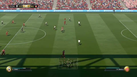 Team attacks opponent gate and kicks goal in computer game Stock Footage 100343330