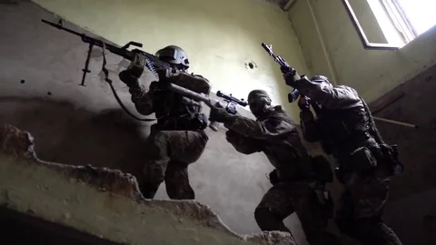 Team breaking into a building Stock Footage 77345194