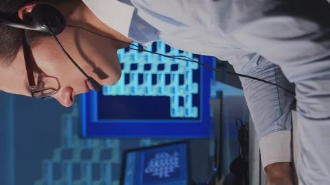 Team of brokers is working in office using workstation and analysis technology Stock Footage 262966931