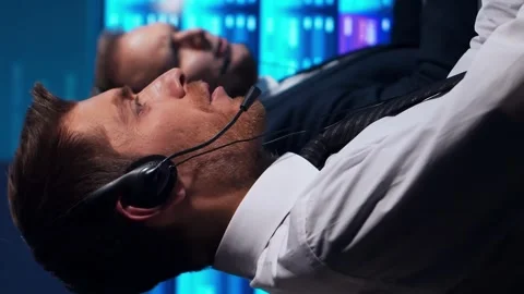 Team of brokers is working in office using workstation and analysis technology Stock Footage 262968324