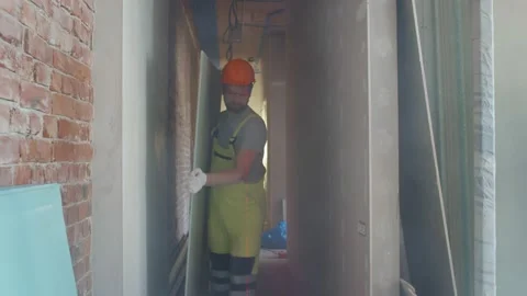 Team of builders working on construction site indoors Stock Footage 133637288