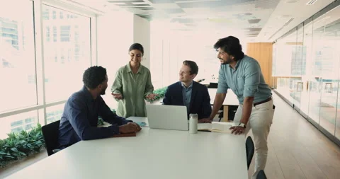 Team building in office of friendly multiethnic staff members Stock Footage 266644585