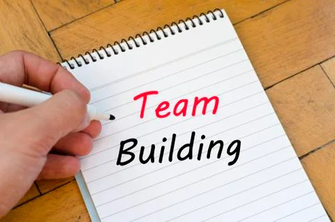 Team building text concept on notebook Stock Photos