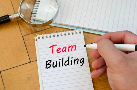 Team building text concept on notebook Stock Photos