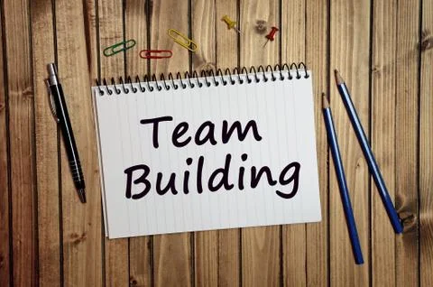 Team building words on notebook Stock Photos
