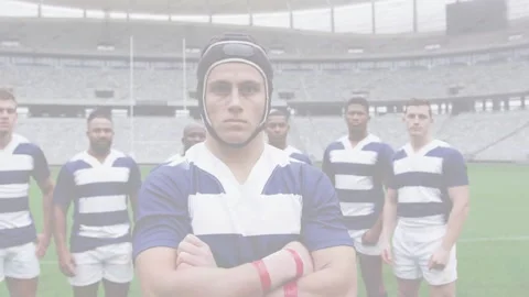 Team captain standing as camera pulling back showing scrum cap goalposts for Stockbeeldmateriaal 333975851