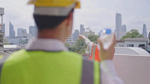 Team of civil engineers is working to inspect the building. and environment. Stock Footage 236843403