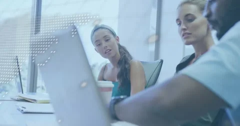 Team clustering around laptop, man reaching, typing, dotted map, scrolling code Video stock 320651296