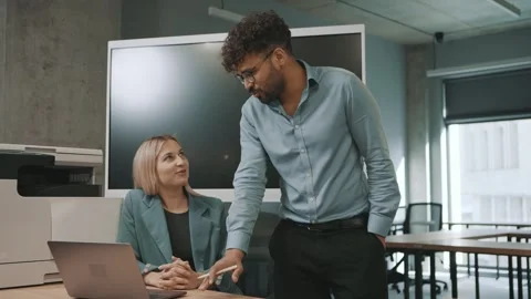 Team collaborates in modern office, exploring strategies with documents Video stock 312258608