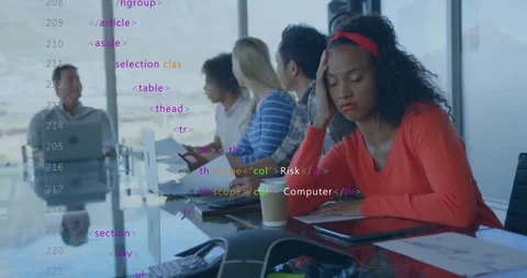 Team collaborating around glass table in business meeting, with floating HTML Stock Footage 308602011
