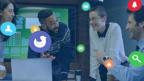 Team collaborating around office table, presenting tech concept with code graphs Stock Footage 307435463