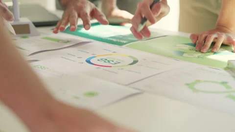 Team Collaborating on ESG Sustainability Strategy. Stock Footage 265827529
