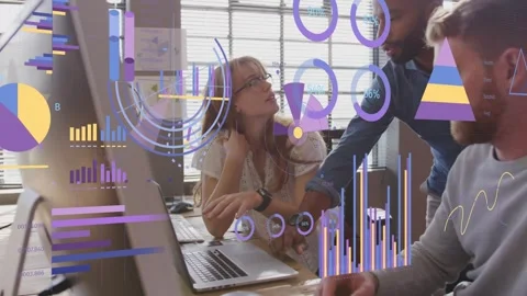 Team collaborating, standing man pointing at monitor, animated charts on screens Stock Footage 333790057