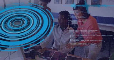 Team collaborating on tech at laptop, reviewing printed photos with blue UI Stock Footage 309095426