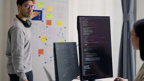 Team Collaboration on Software Development Project in Modern Office. Stock Footage 300246262