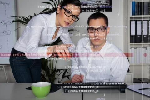 Team Of Computer Programmers Analyzing Code Stock Photos