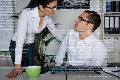 Team Of Computer Programmers Analyzing Code 写真素材