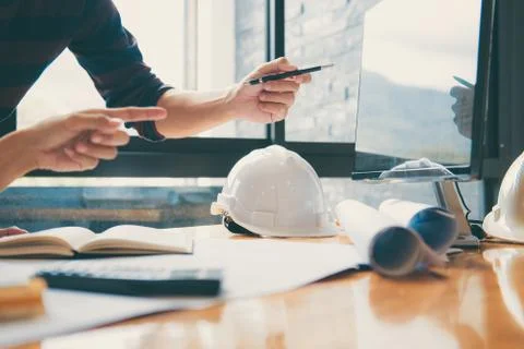 Team of Construction engineering or architect hands working on blueprint insp Stock Photos