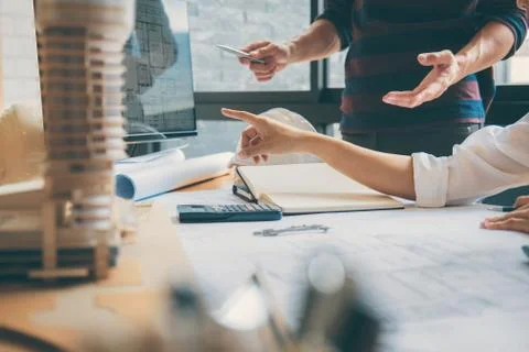 Team of Construction engineering or architect hands working on blueprint insp Foto stock