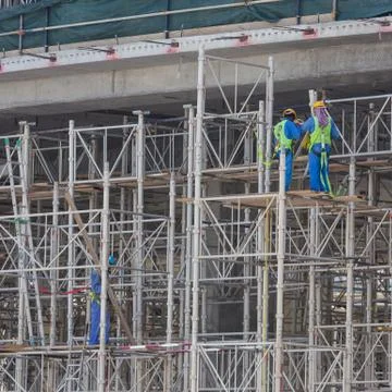 Team of construction worker on construction site. Stock Photos